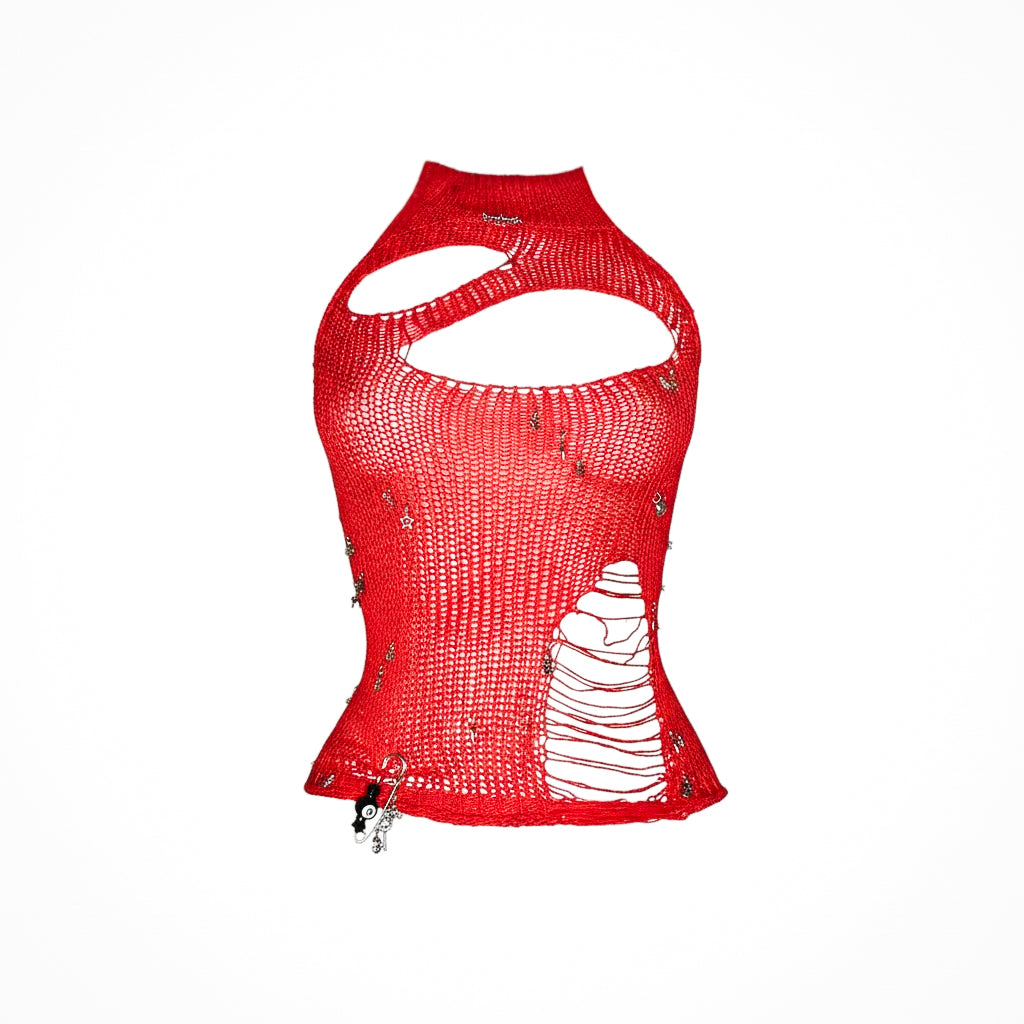 Red deconstructed mesh halter top with shredded knit, sculptural asymmetrical cutouts and raw distressed detailing, photographed on a clean white background.
